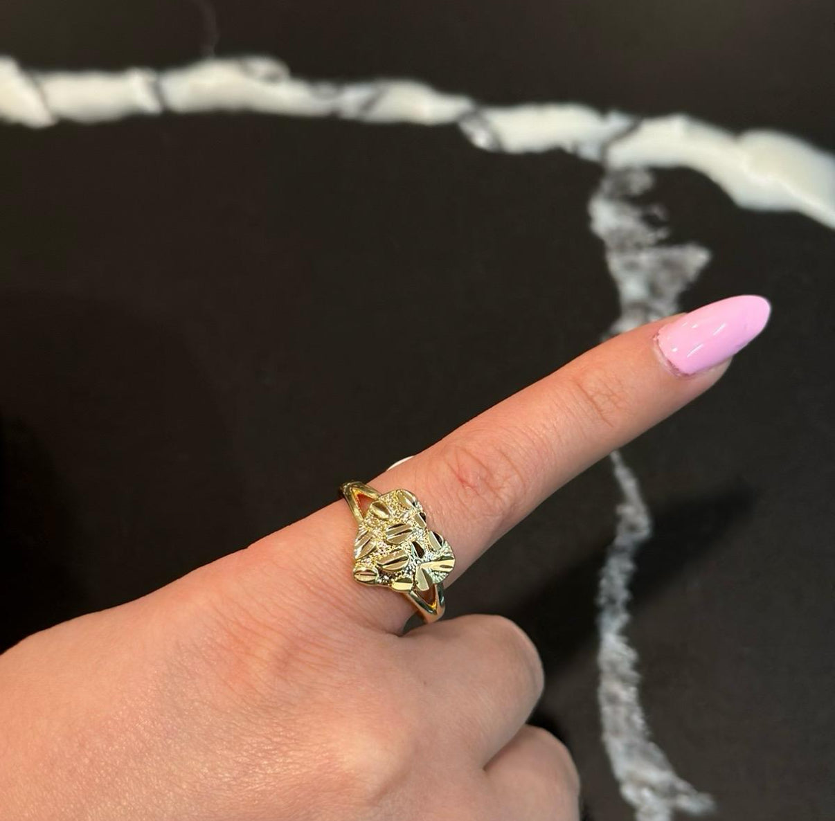 Woman’s gold plated heart nugget ring